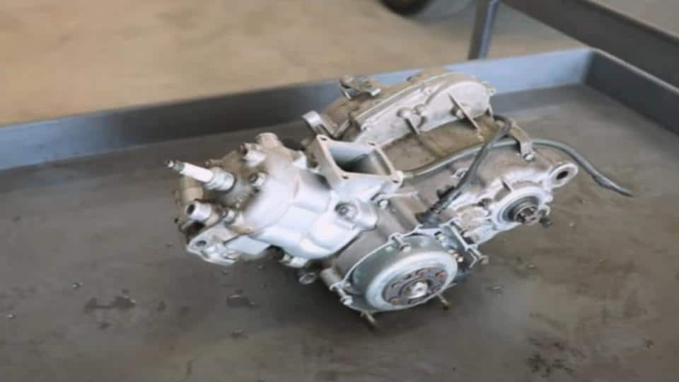 two stroke engine with spark plug on top