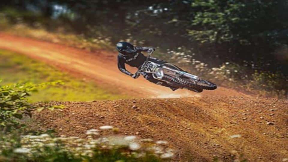 motocross driver whipping the dirt bike