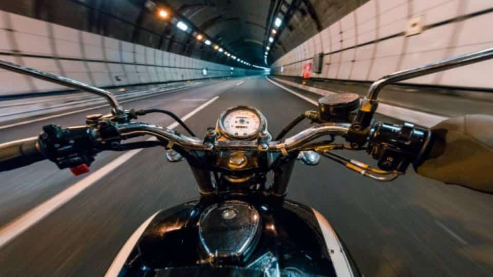 driving motorcycle through the tunnel