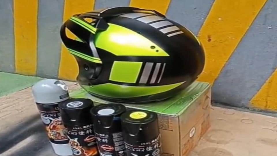 motorcycle helmet and spray paints