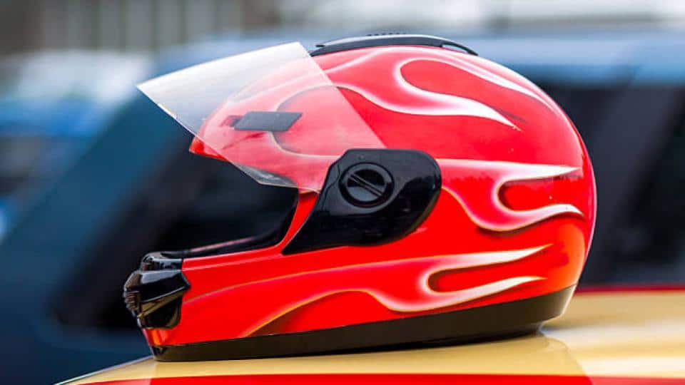 red protective helmet with design