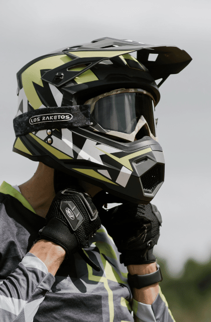 Trying the new helmet size by wearing the helmet
