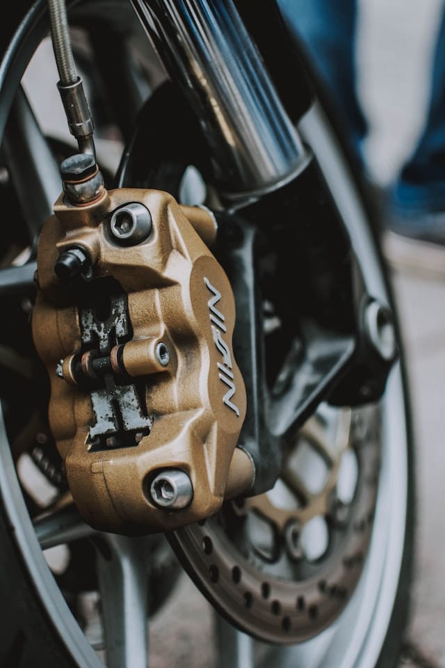 Motorcycle brake rusty disc due to rainy season